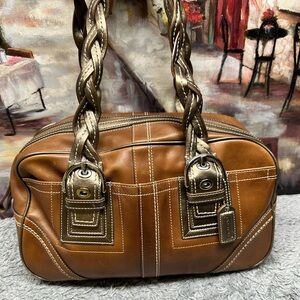 Coach Brown Leather Handbag with Braided Straps and Gold Accents